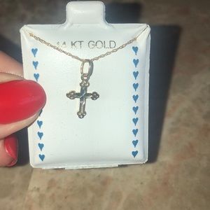 Baby 14 kt yellow gold cross and chain.
